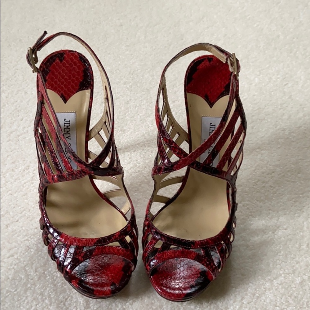 Jimmy Choo “Keenan” strappy red python cage sandal